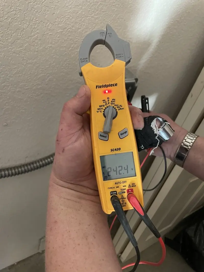 Voltage testing with clamp meter during Generator Installation in West Providence